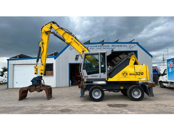 Багер за манипулиране на материали TEREX
