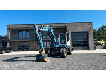 Колесен багер TEREX