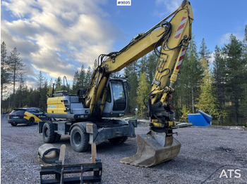 Колесен багер NEW HOLLAND