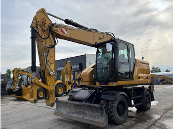 Колесен багер CATERPILLAR M318