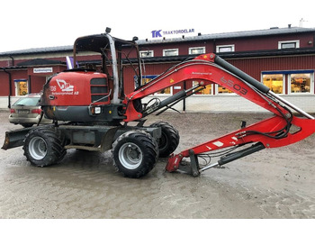 Колесен багер NEUSON