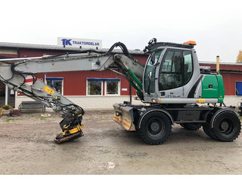 Колесен багер NEW HOLLAND