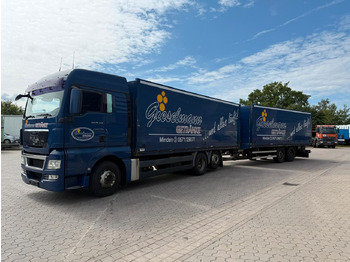 За напитки камион MAN TGA Schwenkwand-Getränkeaufbau incl. Anhänger: снимка 2 За напитки камион MAN TGA Schwenkwand-Getränkeaufbau incl. Anhänger: снимка 2