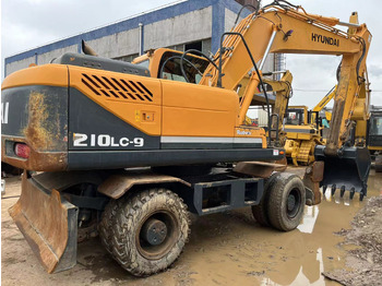 Колесен багер HYUNDAI R210