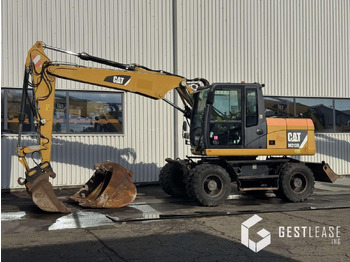 Колесен багер CATERPILLAR M313D