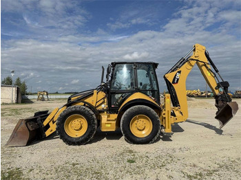 Багер-товарач CATERPILLAR