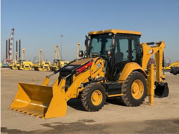 Багер-товарач CATERPILLAR