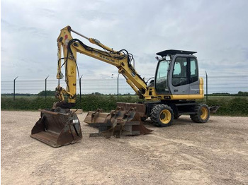 Колесен багер NEW HOLLAND