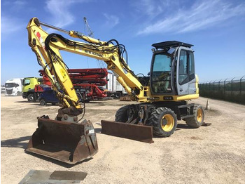 Колесен багер NEW HOLLAND