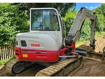 Мини багер TAKEUCHI