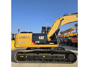 Багер CATERPILLAR 323DL