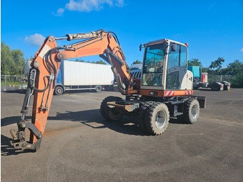 Колесен багер TEREX