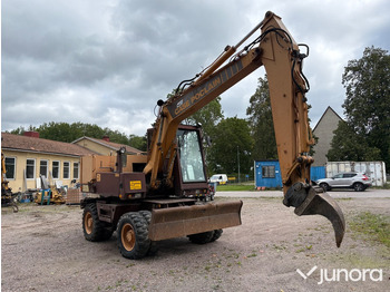 Колесен багер CASE