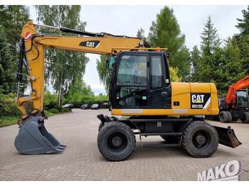 Колесен багер CATERPILLAR M313D