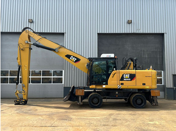 Багер за манипулиране на материали CATERPILLAR