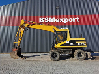 Колесен багер CATERPILLAR M315