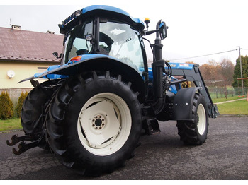 Трактор Ciągnik New Holland NH TS125A 6 cylindrów 2004 Ciągnik rolniczy New Holland TS125A: снимка 4 Трактор Ciągnik New Holland NH TS125A 6 cylindrów 2004 Ciągnik rolniczy New Holland TS125A: снимка 4