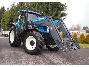 Трактор Ciągnik New Holland NH TS125A 6 cylindrów 2004 Ciągnik rolniczy New Holland TS125A: снимка 2 Трактор Ciągnik New Holland NH TS125A 6 cylindrów 2004 Ciągnik rolniczy New Holland TS125A: снимка 2