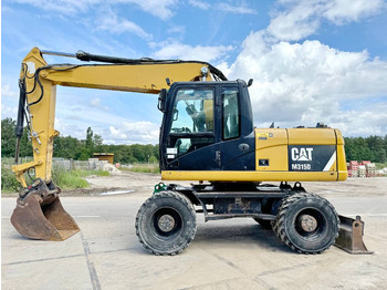 Колесен багер CATERPILLAR M315D