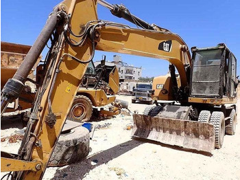 Багер CATERPILLAR M320F