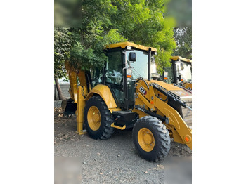 Багер-товарач CATERPILLAR