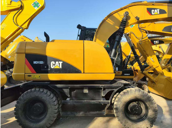 Колесен багер CATERPILLAR 315D