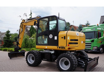 Колесен багер TEREX