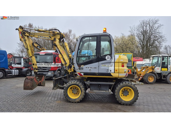 Колесен багер NEW HOLLAND