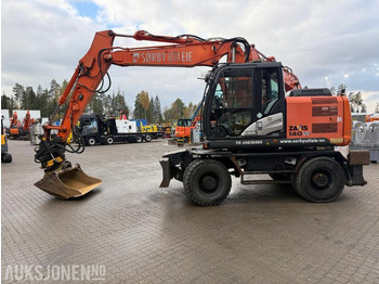 Багер HITACHI ZX140W