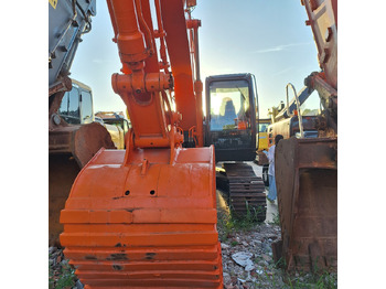 Багер HITACHI ZX210