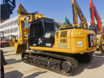 Багер CATERPILLAR 323D