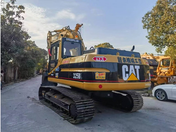 Багер за манипулиране на материали CATERPILLAR
