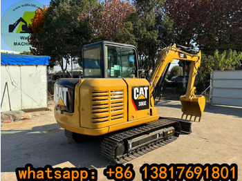 Мини багер CATERPILLAR