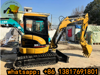 Мини багер CATERPILLAR
