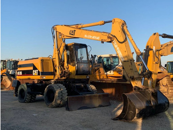 Колесен багер CATERPILLAR M315