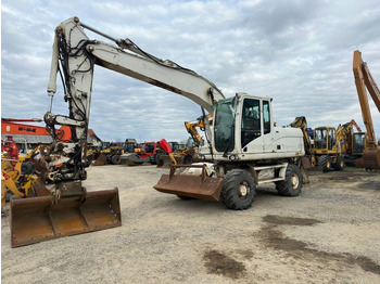 Колесен багер CATERPILLAR M316D