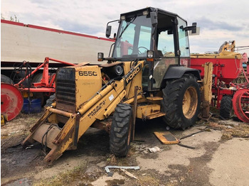 Багер-товарач NEW HOLLAND