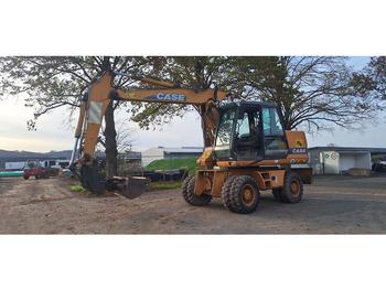 Колесен багер CASE