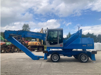 Багер за манипулиране на материали FUCHS