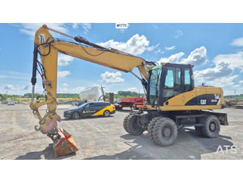 Колесен багер 2008 CAT M316D: снимка 5