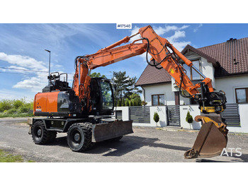 Колесен багер HITACHI ZX140W-6
