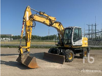 Колесен багер NEW HOLLAND