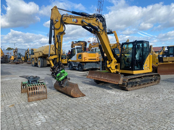 Мини багер CATERPILLAR