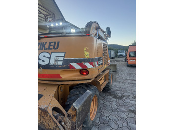 Колесен багер Case WX145: снимка 5