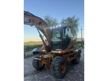 Колесен багер Case WX145: снимка 2
