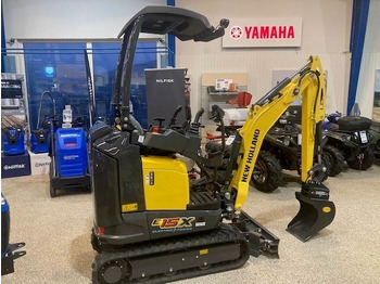 Мини багер NEW HOLLAND