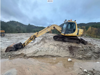 Багер KOMATSU PC130