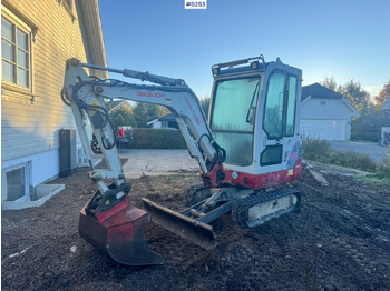 Мини багер TAKEUCHI