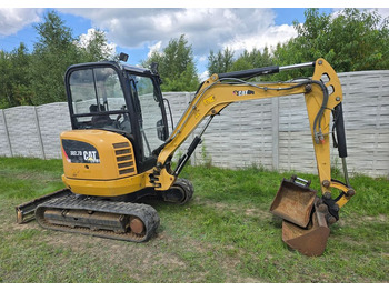 Мини багер CATERPILLAR