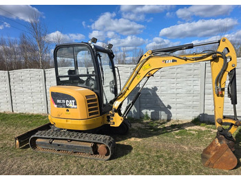 Мини багер CATERPILLAR